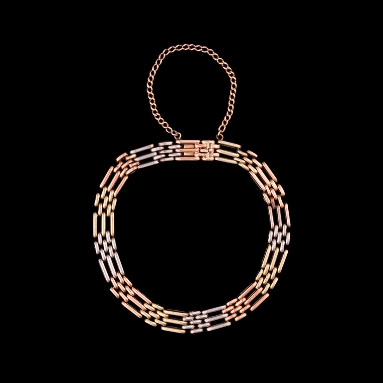 A BRACELET. БРАСЛЕТ, золото 56 ​​пр. в трех цветах, Федор Руч, Санкт-Петербург, 1896-1888 гг. Вес 22 гр.