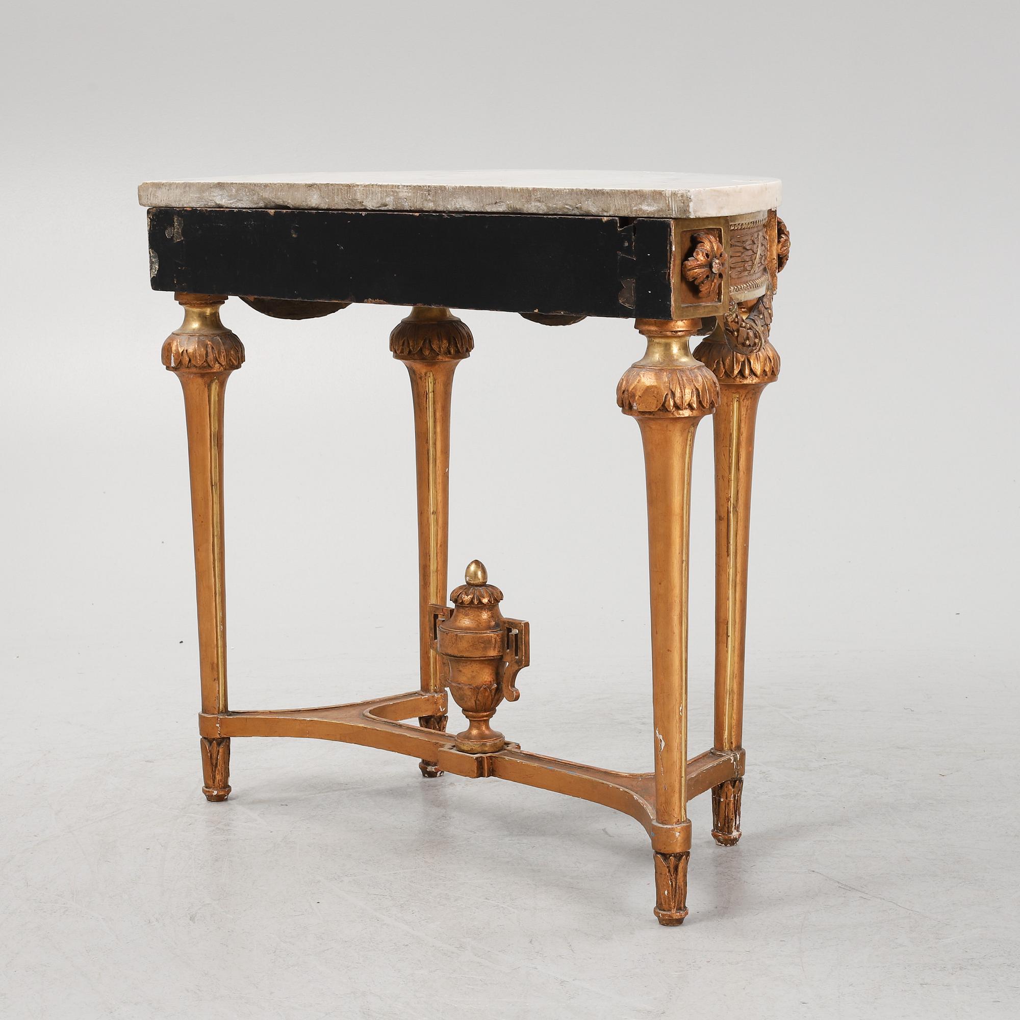 A Gustavian giltwood and marble console table, late 18th century.
