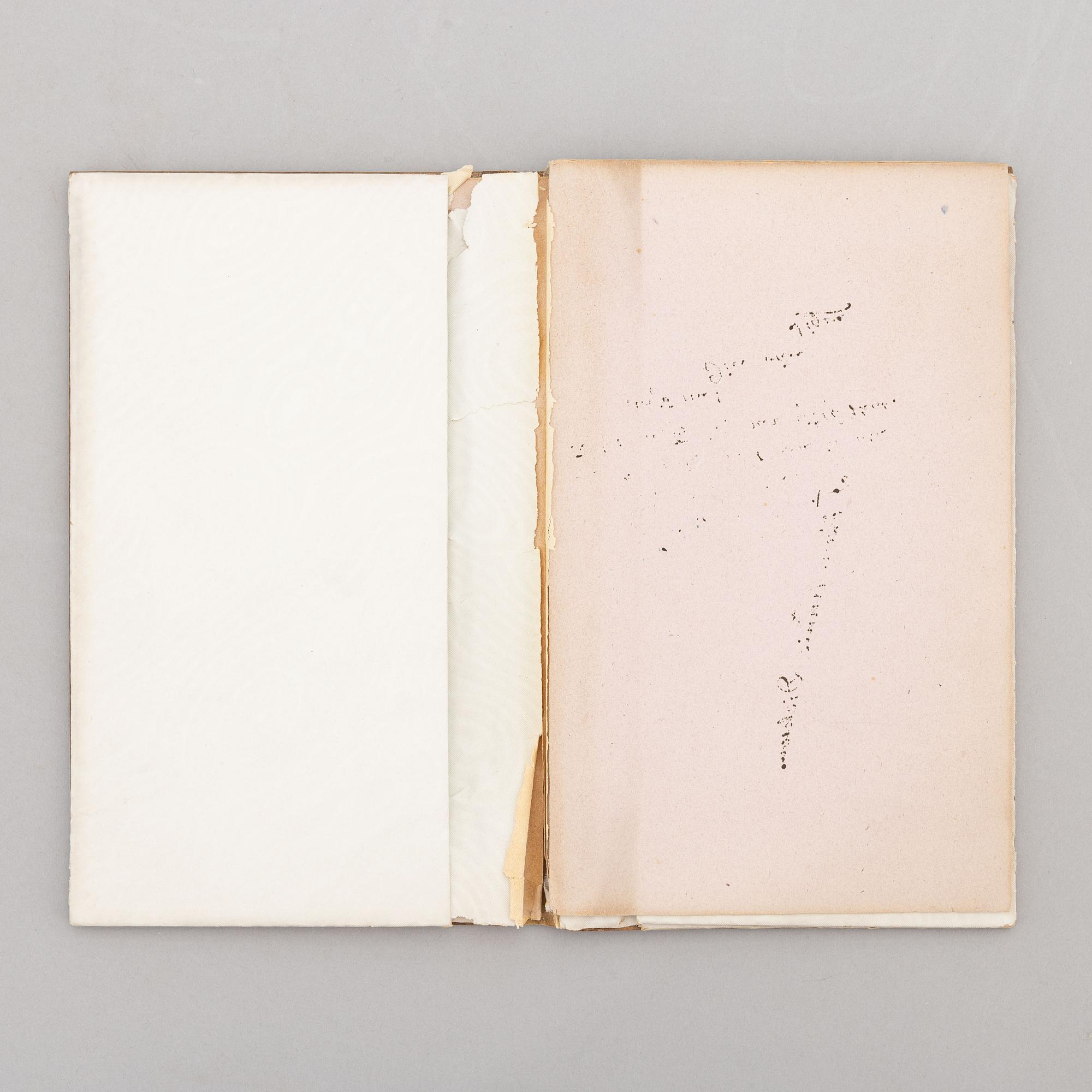 A keepsake book embellished by Ellen Jolin featuring a 'Santa Claus' figure.