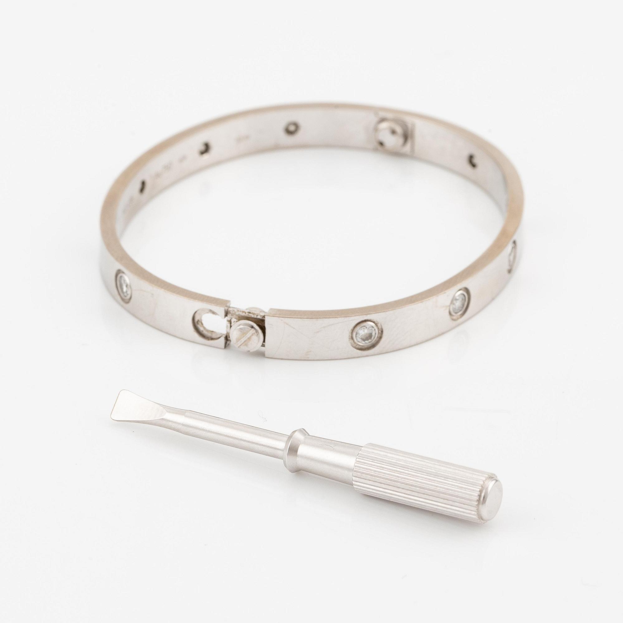 Cartier armband " Love" 18K vitguld med tio runda briljantslipade diamanter.