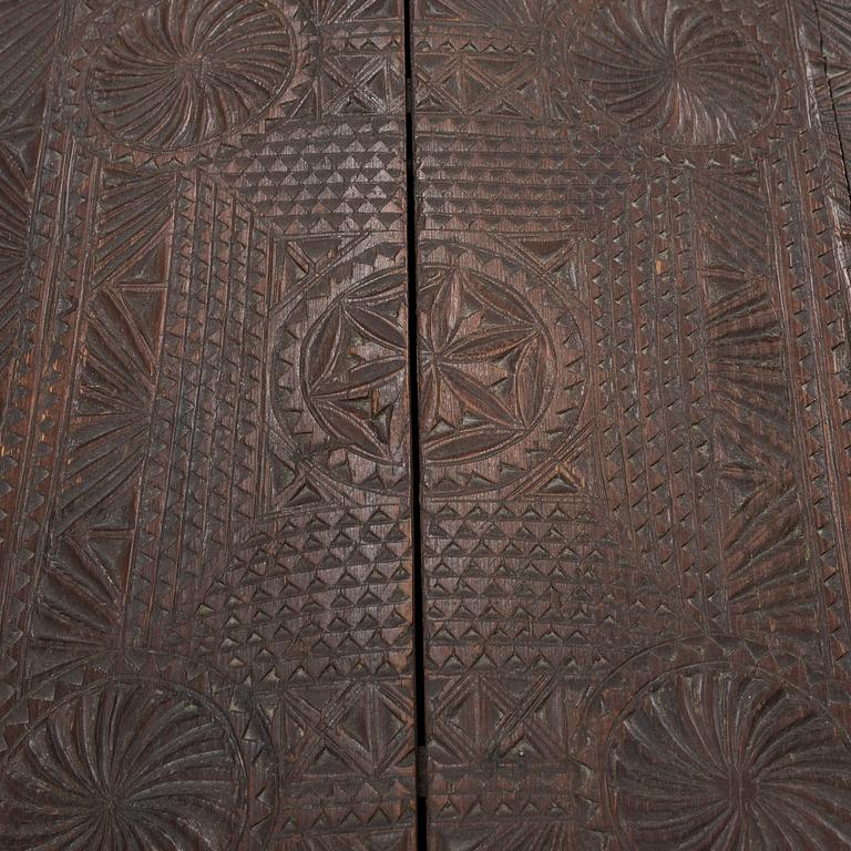 A late 18th or early 19th century wooden box on a stand from early 20th century.