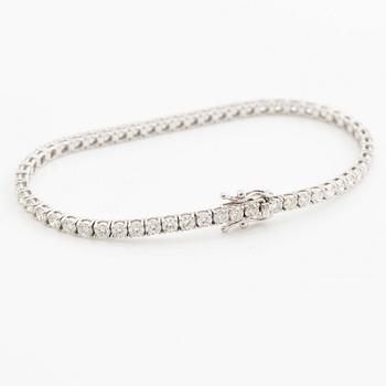 Tennis bracelet 18K white gold with brilliant-cut diamonds.