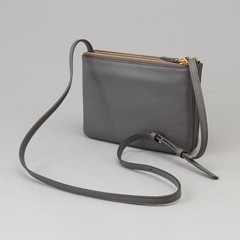 A Cèline Trio bag.