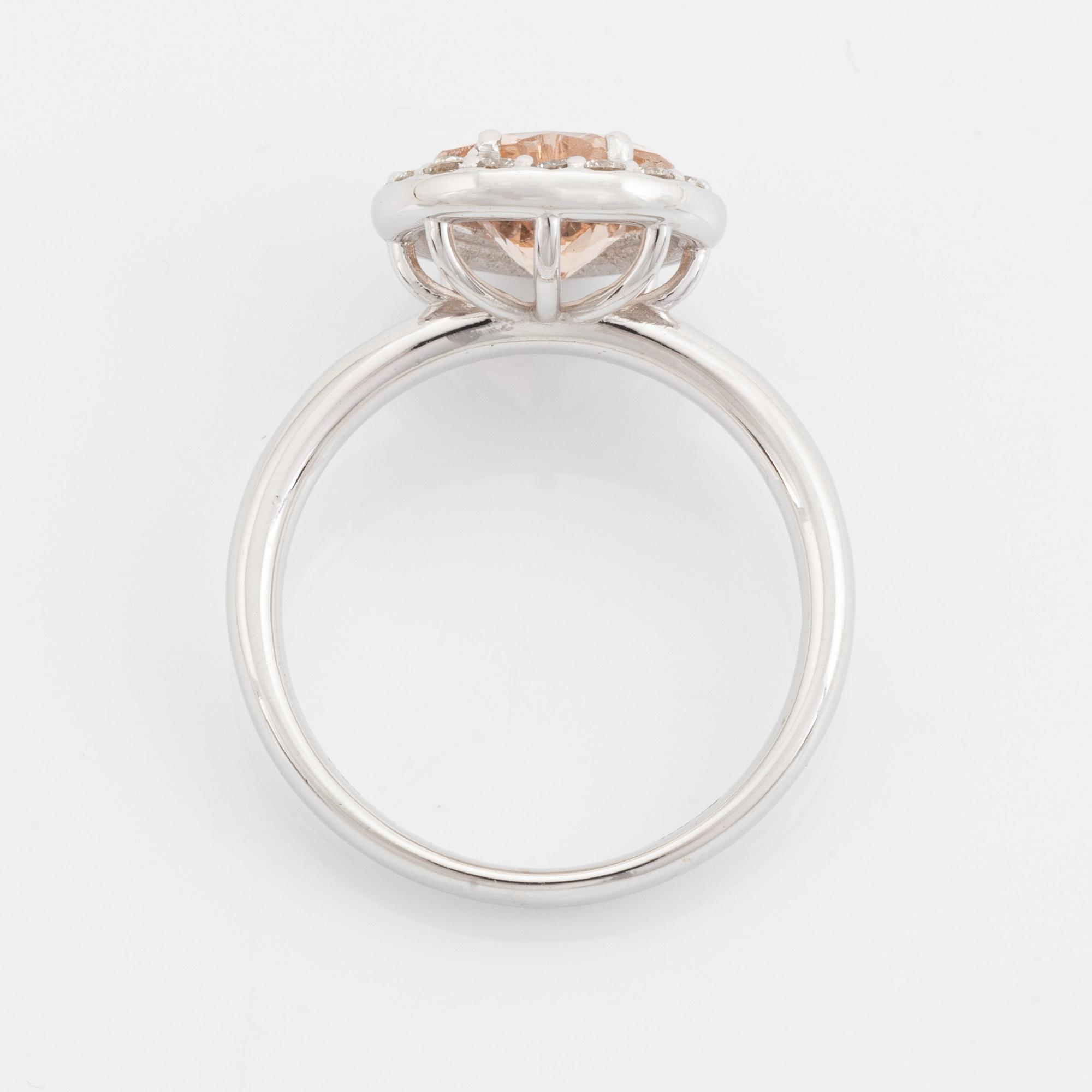 Heart shaped morganite and brilliant cut diamond ring.