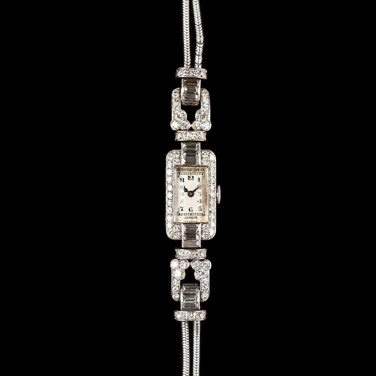 ARMBANDSUR, Patek Philippe & Co, platina med baguette- och briljantslipade diamanter, tot. ca 4 ct. 1930-tal.