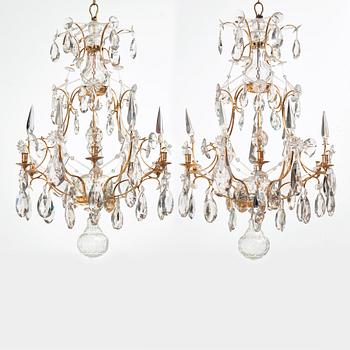 A pair of Swedish Rococo 18th century six-light chandeliers by Olof Westerberg dated 1789 and 1790.