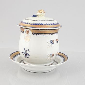 A porcelain tea caddie and mug with cover and saucer, China, Qing dynasty, late 18th century.