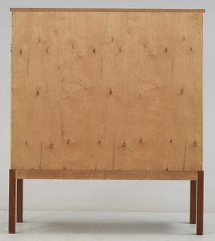 A Josef Frank mahogany cabinet, the sides and doors covered in handpainted wallpaper, Svenskt Tenn, circa 1950.