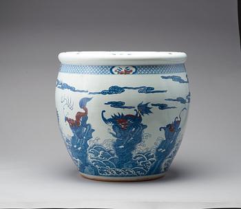 A pair of massive Chinese blue and white and red basins, 20th Century.