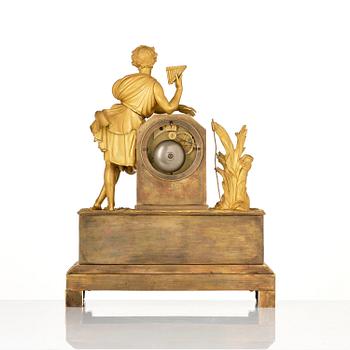 A French Empire ormolu and patinated bronze mantel clock, Paris, early 19th century.