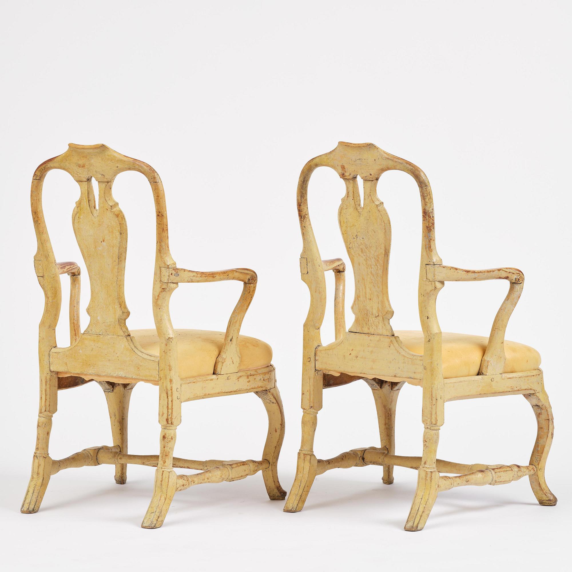 A pair of rococo open armchairs, Stockholm, later part 18th century.