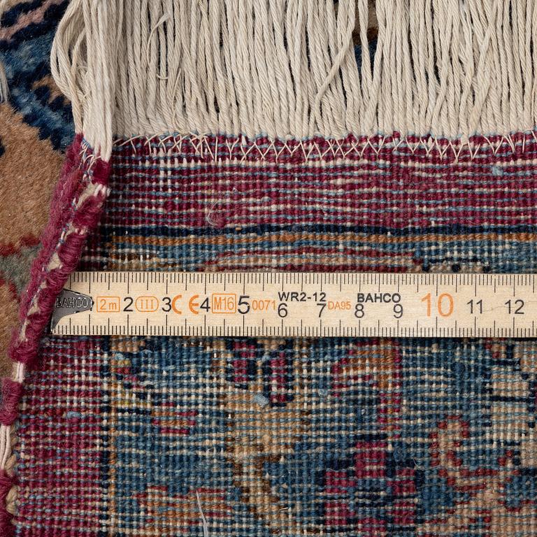 An antique Tabriz carpet, West Persia, c. 447 x 322 cm.