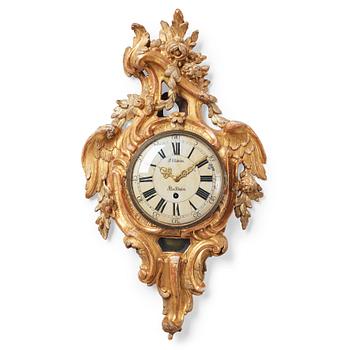 81. A Swedish Rococo 18th century wall clock by I. Ekström.