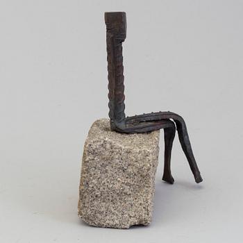 A sculpture by Peter Starck, rebar and cobblestone.