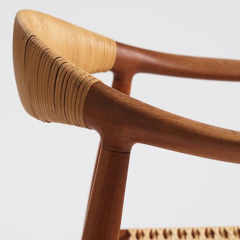 Hans J. Wegner, a pair of teak and rattan 'The Chair', JH-503, Johannes Hansen, Denmark 1950s.