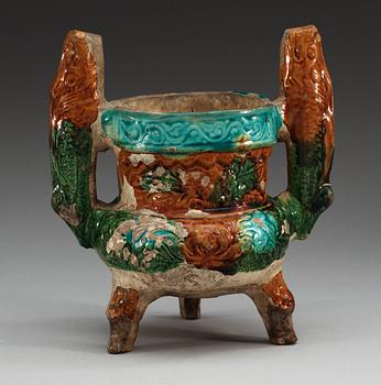 A glazed pottery tripod censer, Ming dynasty, 16th Century.