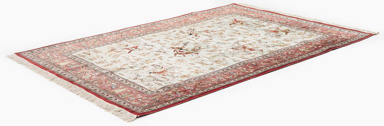 A silk Qum, rug Central Persia (Iran), signerad c. 200 x 135 cm.