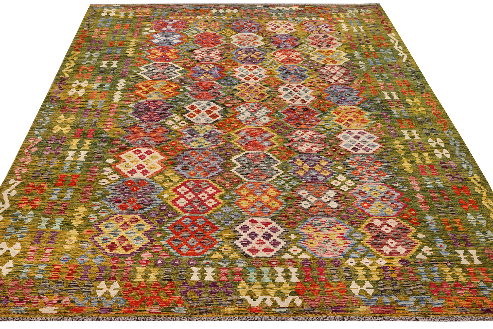 An Afghan Kilim carpet, c. 357 x 266 cm.