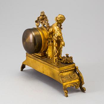 A LATE 19TH CENTURY GILT METAL MANTLE CLOCK in the Rococo style.