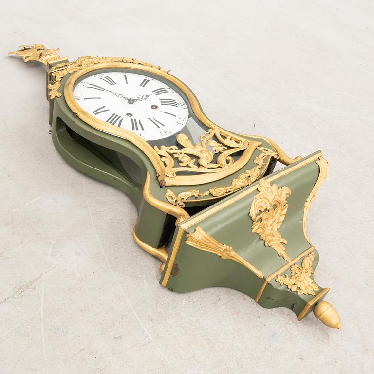 Mantel clock with console, Rococo style, 19th century.