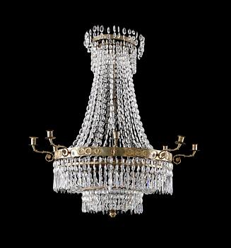 937. A Swedish Empire eight-light chandelier.