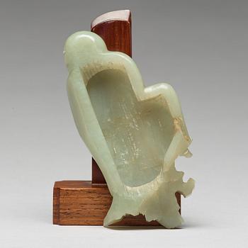 A finely carved nephrite sculpture of an immortal, Qing dynasty, probably Qianlong (1736-95).