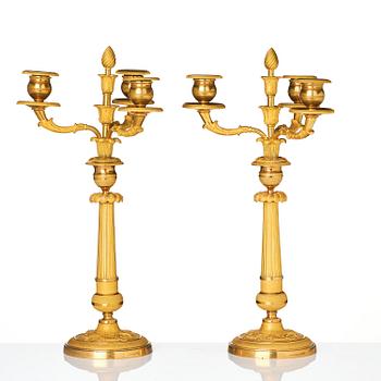 A pair of Empire ormolu three light Candelabra.
