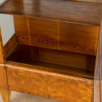 A Swedish first half of the 19th century display cabinet veneered with birch.