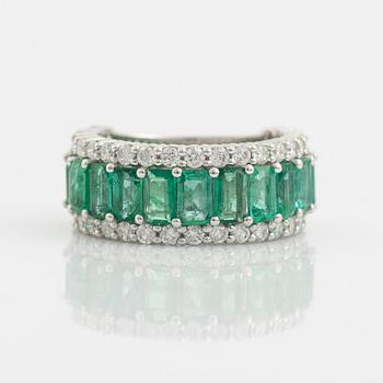 Emerald and brilliant cut diamond ring.