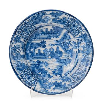 A large Dutch faience dish, second half of the 17th Century.