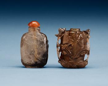 A hair crystal snuff bottle and a quartz snuff bottle.