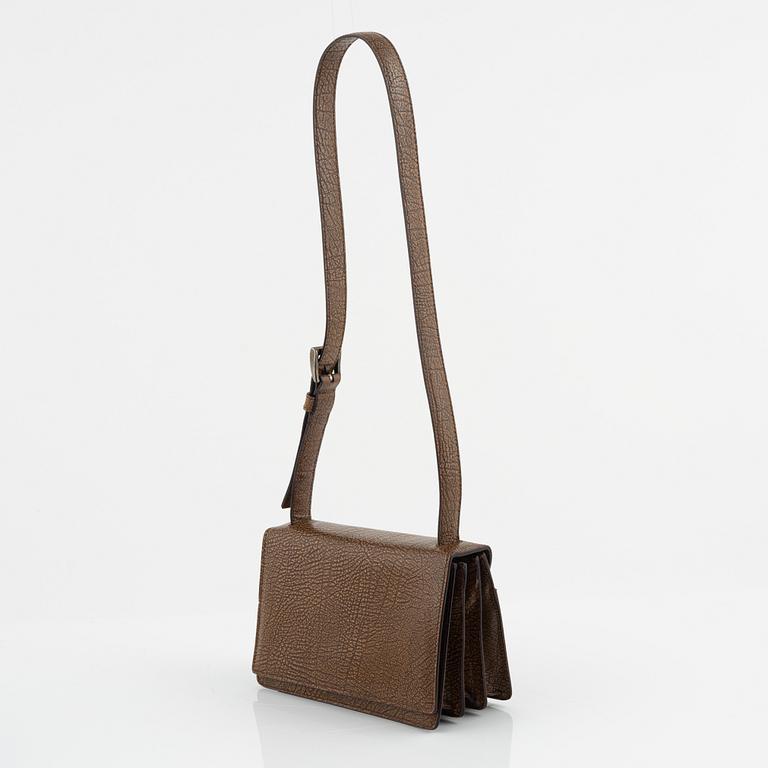 Prada, a brandy colored bag.