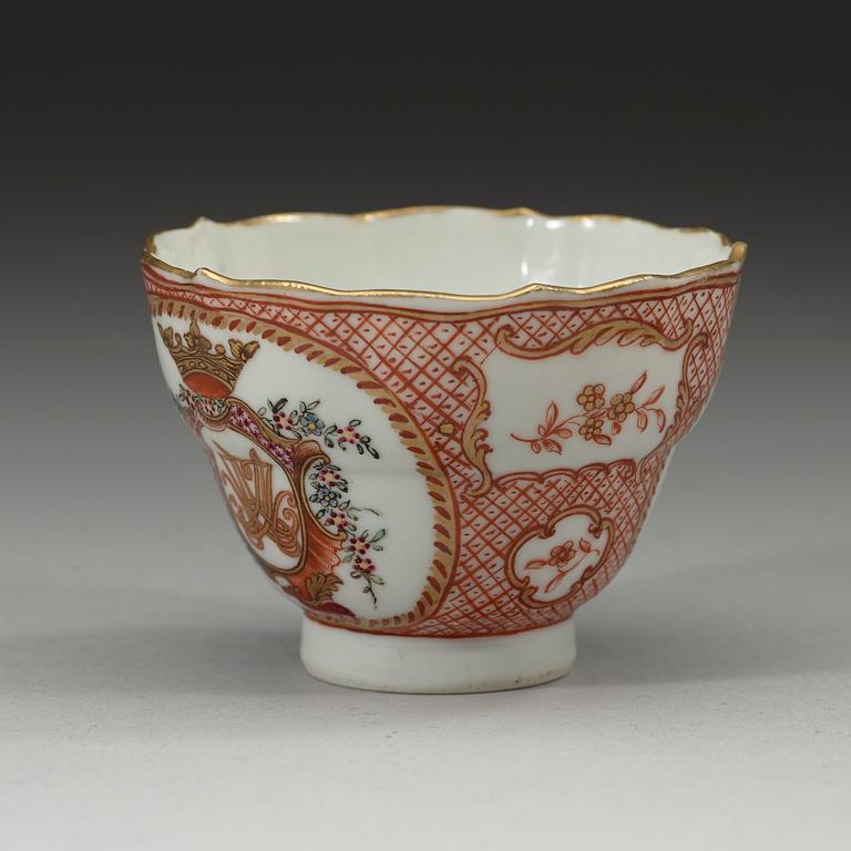 A export cup and saucer with a crowned cartush and monogram in famille rose, Qing dynasty Qianlong (1736-1795).