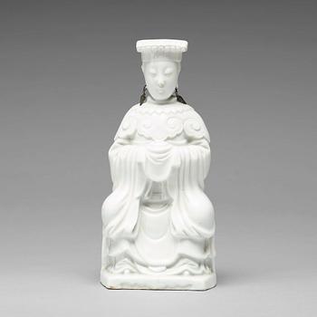 630. A blanc de chine figure of a deity, Qing dynasty, 19th Century.