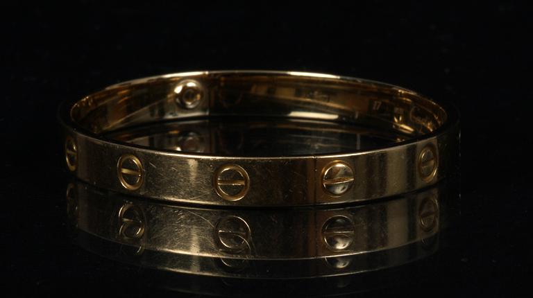 ARMBAND, 18 K guld, "Lovebracelet", Cartier. 32 gram.