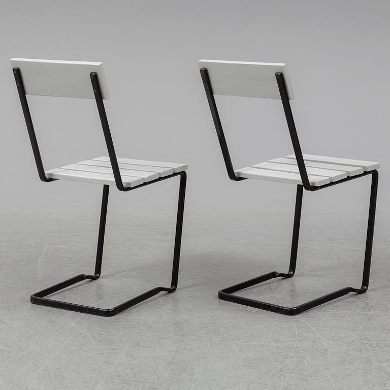 A pair of Grythyttan garden chairs.