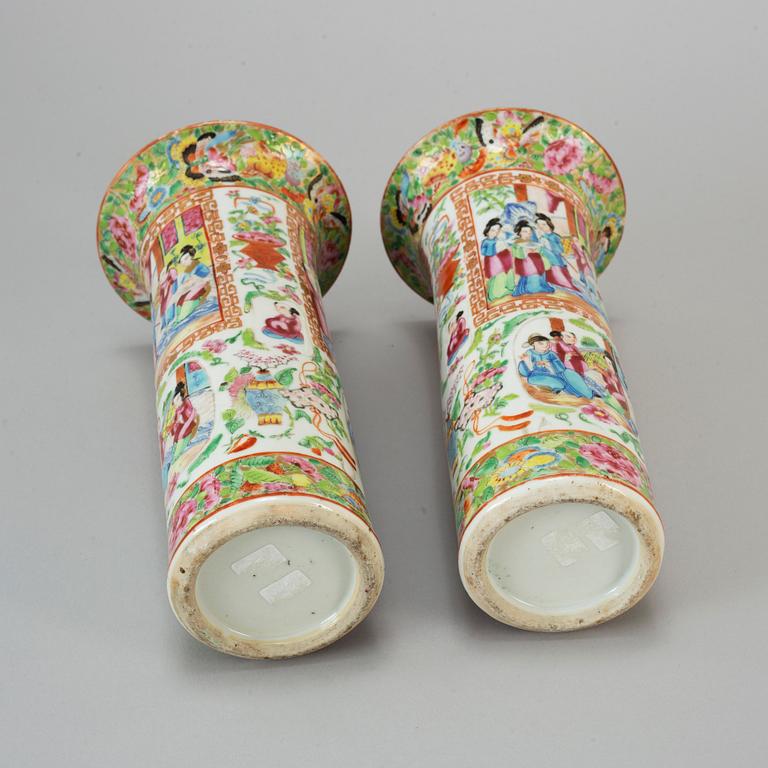 A pair of famille rose Canton trumpet vases, Qing dynasty, 19th century.