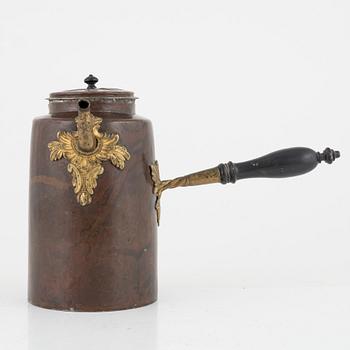A Swedish copper and brass rococo coffee pot, later part of the 18th century.
