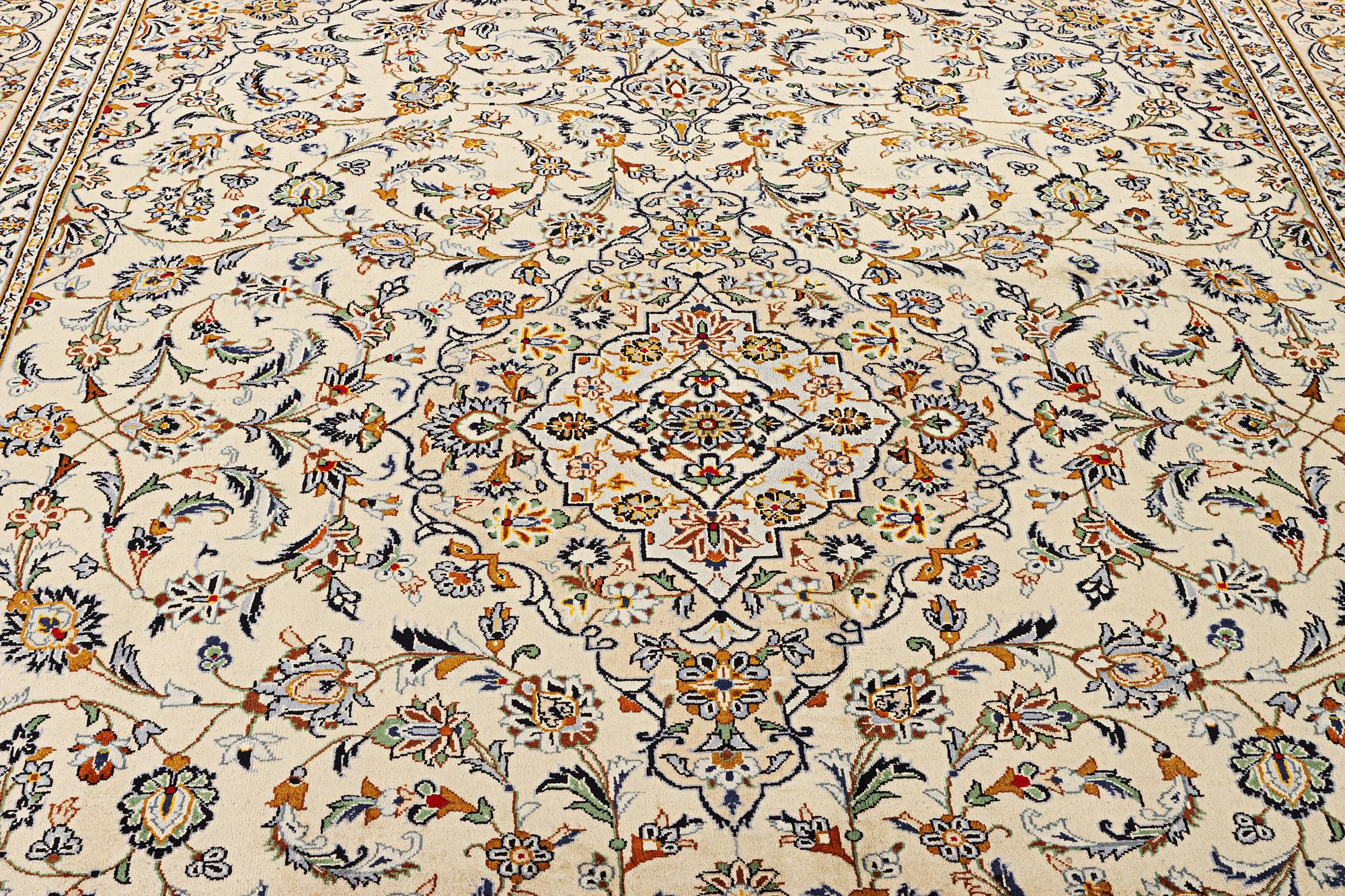 A Kashan carpet, c. 388 x 285 cm.