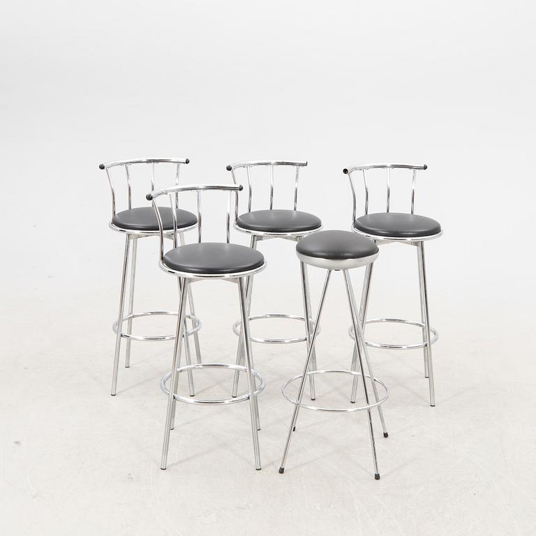 A set of four plus one bar stools Johansson desing later part of the 20th century.