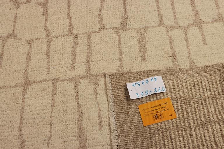 A Moroccan carpet, modern design, c. 358 x 262 cm.