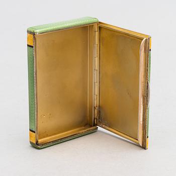 A gilded silver cigarette case with enamel and rose-cut diamonds. Moscow, early 20th century.