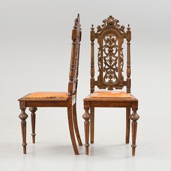 A set of six late 1800s chairs.