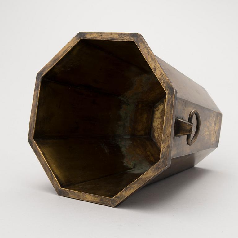 A patinated brass champagne bucket from the first half of the 20th Century.