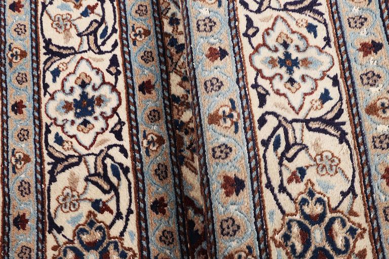 A carpet, Nain, part silk, 9 laa, ca. 285 x 200 cm.
