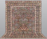 A Kerman Laver carpet, 'Millefleur', approx. 388 x 300 cm.