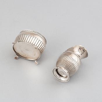 A silver creamer by Johan Petter Ahlforss, Strängnäs, 1833 and a silver sugar box, Kristianstad, 1928.