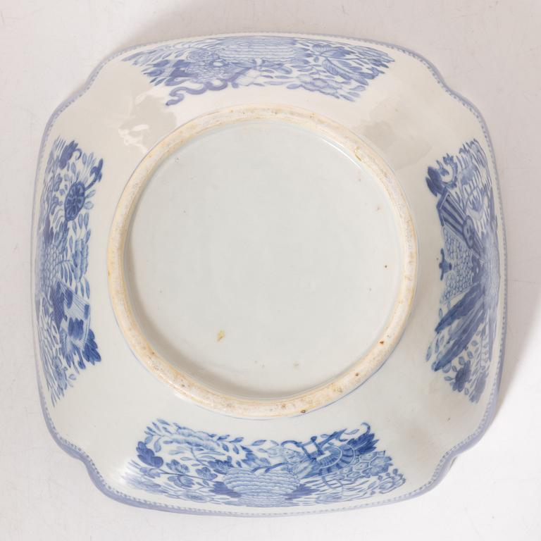 A group  of three serving dishes, a serving bowl, a cup, and seven plates, porcelain, including China 18th century.