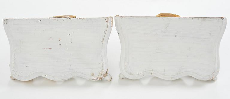 A pair of French Louis XVI-style consoles, late 19th century.