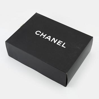 Chanel, a black leather and gold tone chain 'Shopper', 1991-1994.
